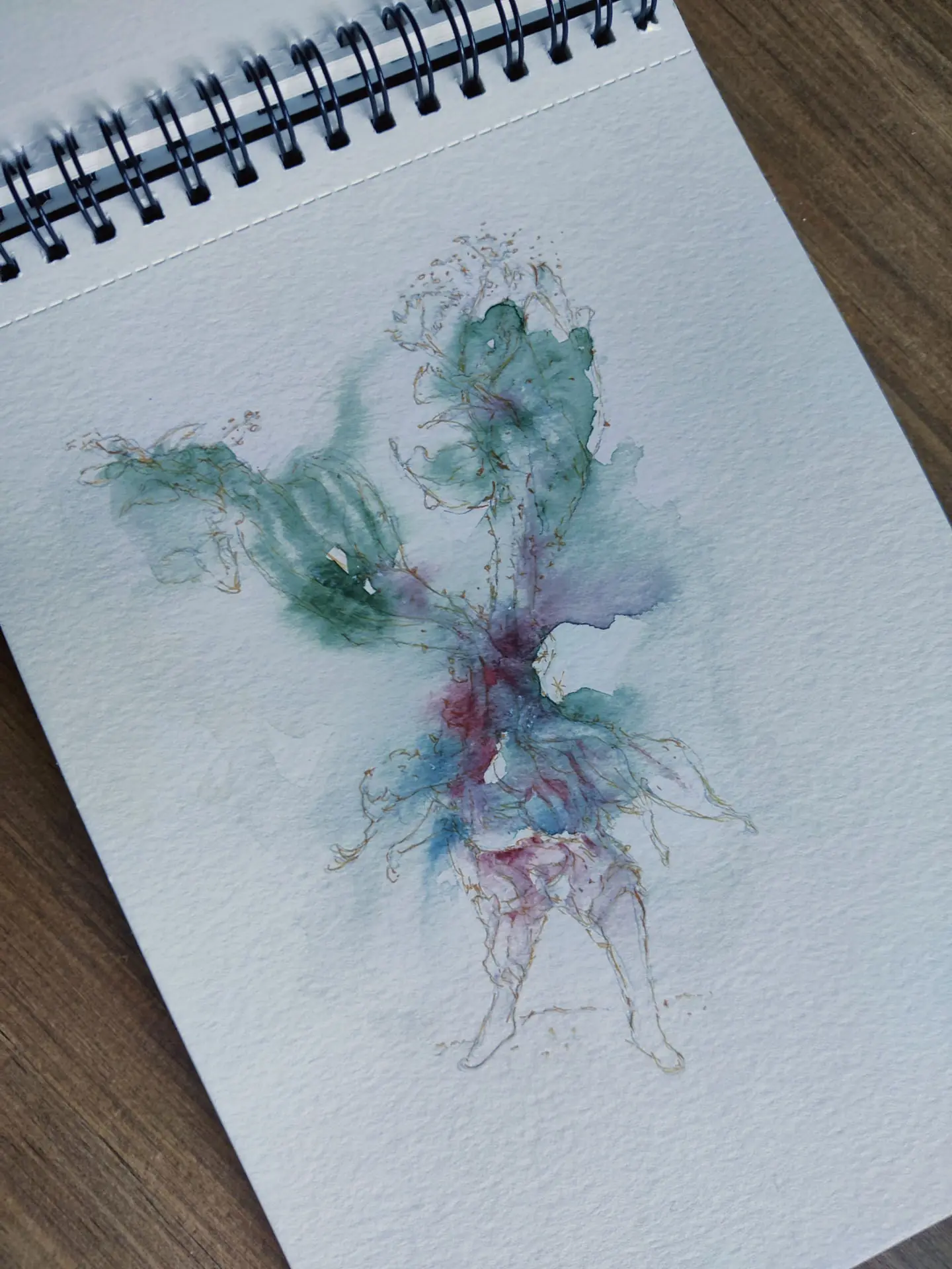 Colourful imaginary creature painted in a spiral sketchbook by Nicolas Crombez